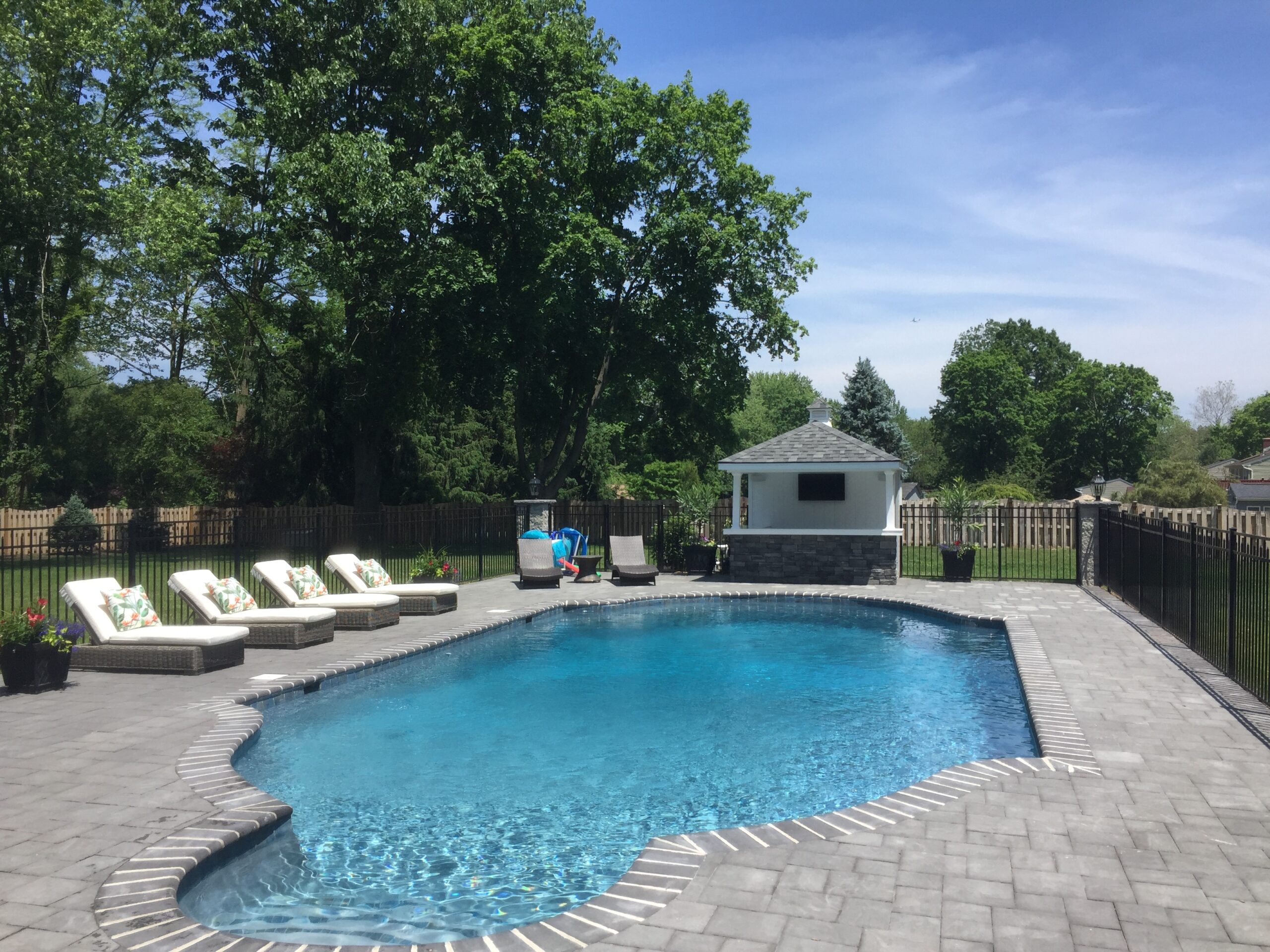 Siesta Pool  House with stone front