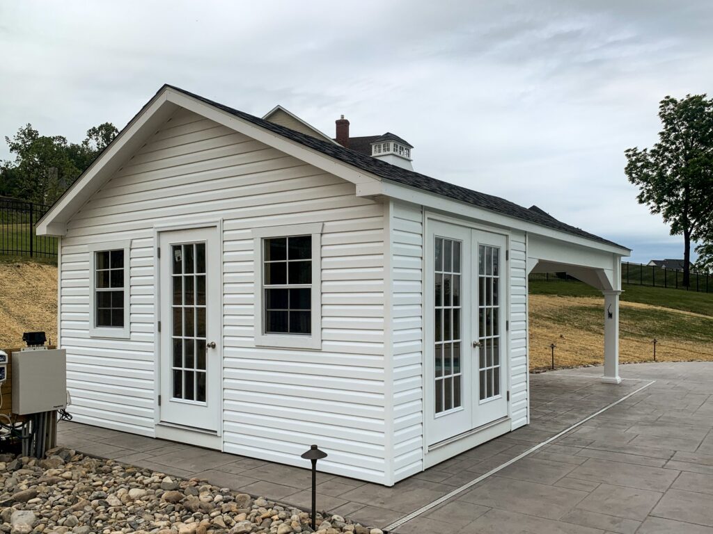 Amish-built pool house beside an inground pool in Wall Township, NJ